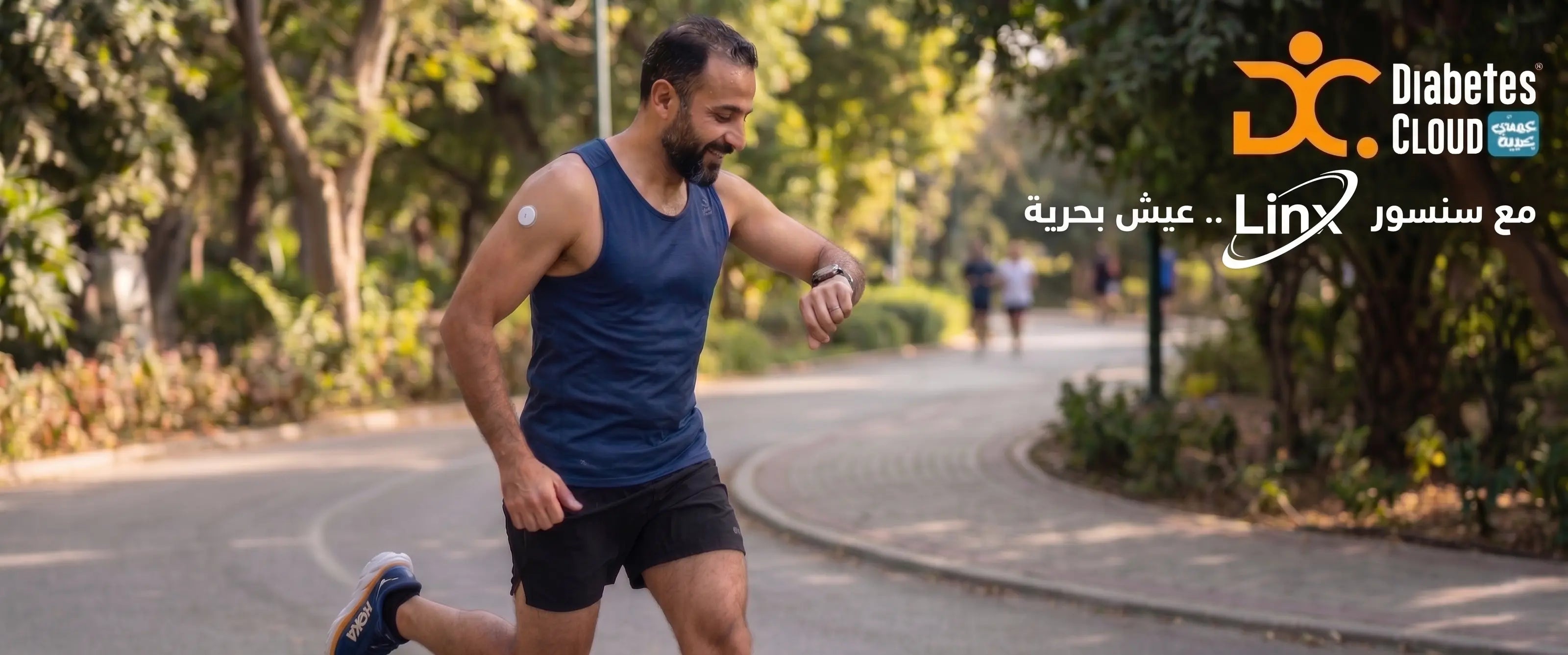 An athletic man wears a Bluetooth smartwatch synced to a shoulder-mounted Linx glucose sensor, receiving readings every 60 seconds.
